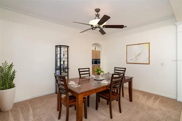 a view of a dining room with furniture