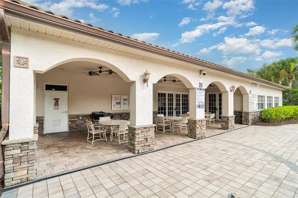 a view of a swimming pool with a patio