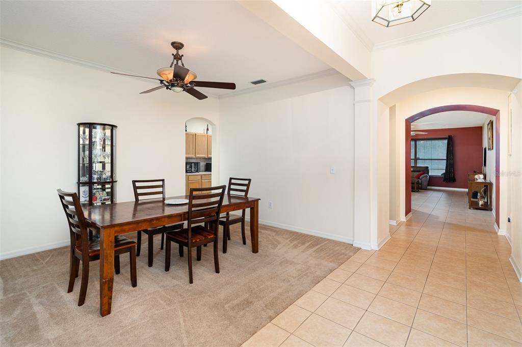 10903 Wildcat Drive Riverview, FL 33579 - Photo 4 of 45 a view of a dining room with furniture