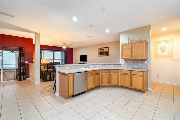 a kitchen with sink cabinets and window