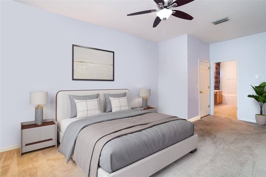 10903 Wildcat Drive Riverview, FL 33579 - Photo 10 of 45 a bedroom with bed and ceiling fan