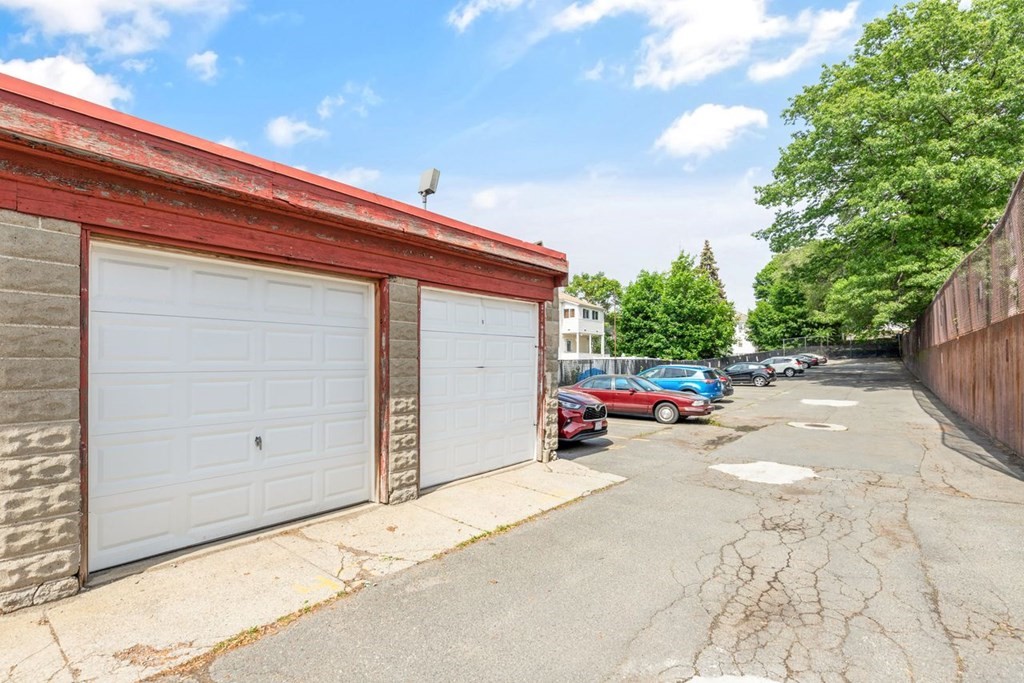 205 Ferry Street, Unit 409 Everett, MA 02149 - Photo 23 of 24 a house view with a backyard space