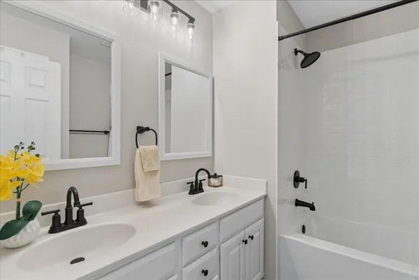 a bathroom with a sink and a tub