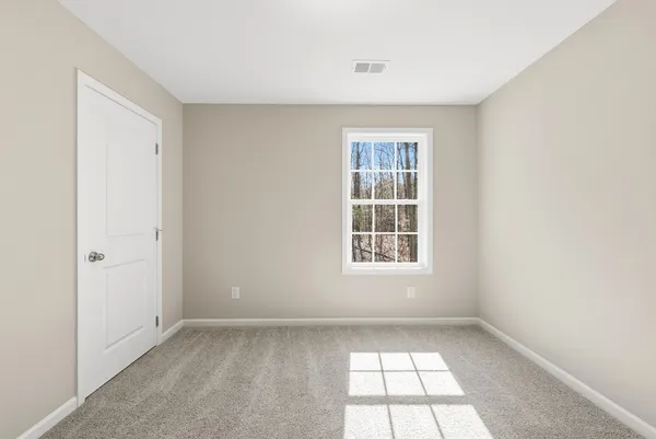 an empty room with a window