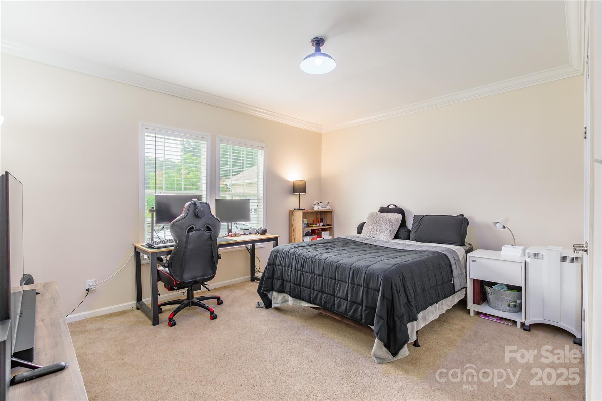 5919 Austin Road Monroe, NC 28112 - Photo 24 of 34 a bedroom with a bed and a desk