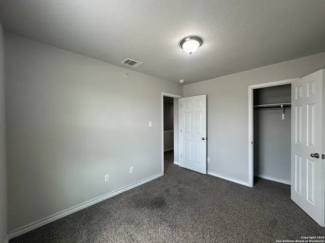 a kitchen that has a sink and a stove