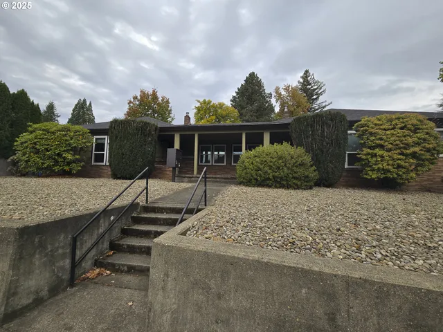 a view of backyard with seating space