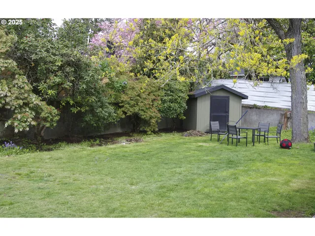 a backyard of a house with lots of green space