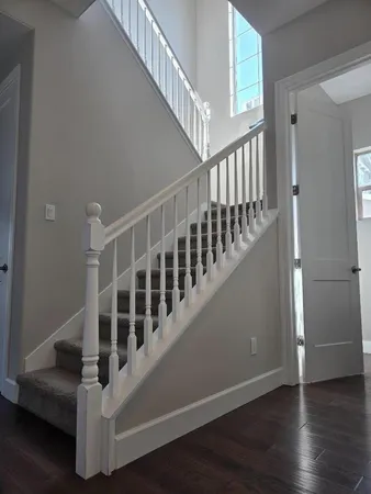 a view of entryway with wooden floor