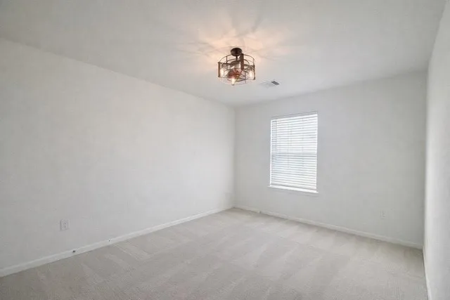 an empty room with a window