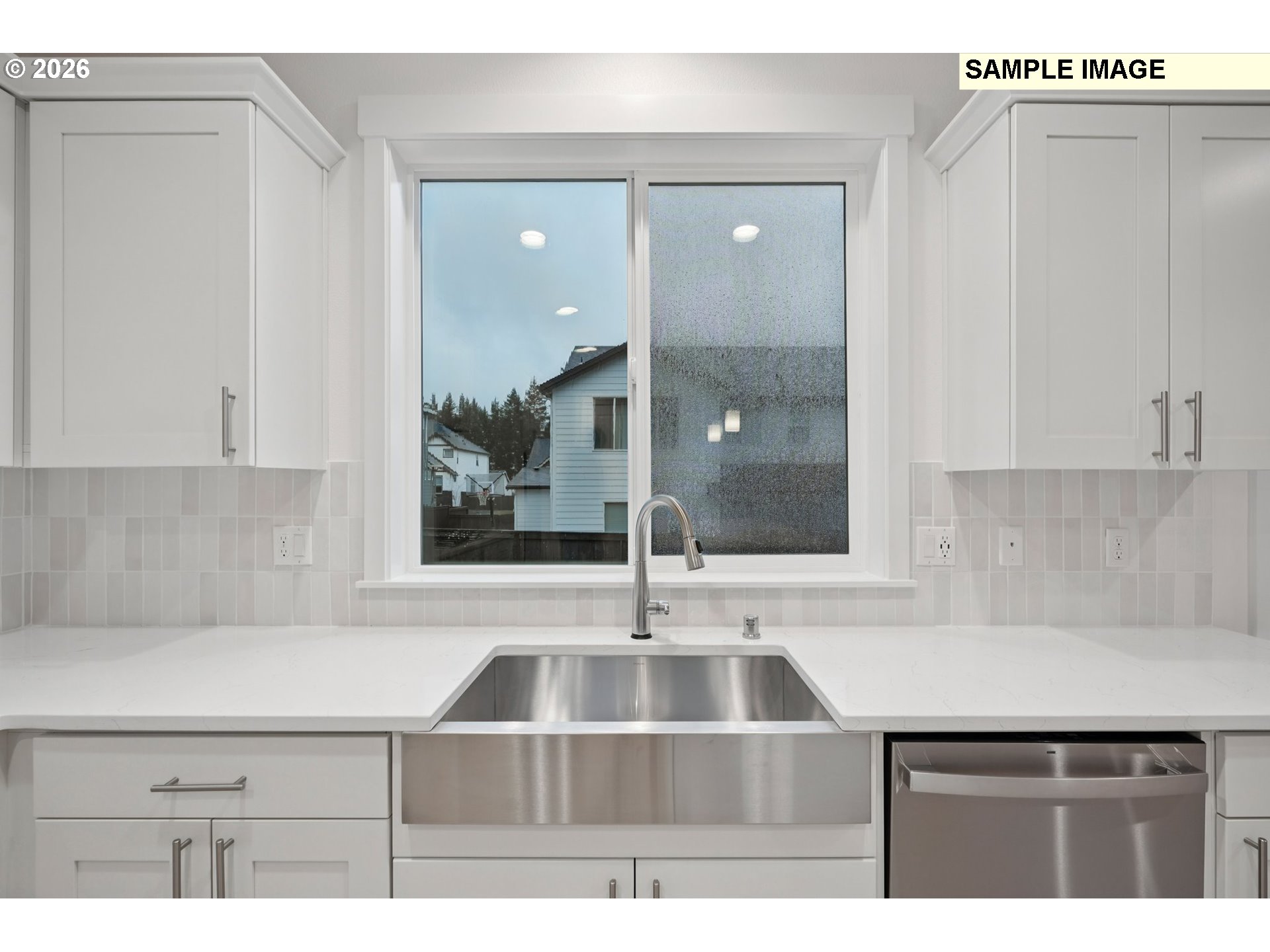 9302 North Clover Street, Unit LOT 267 Camas, WA 98607 - Photo 12 of 33 a kitchen with a sink and a window