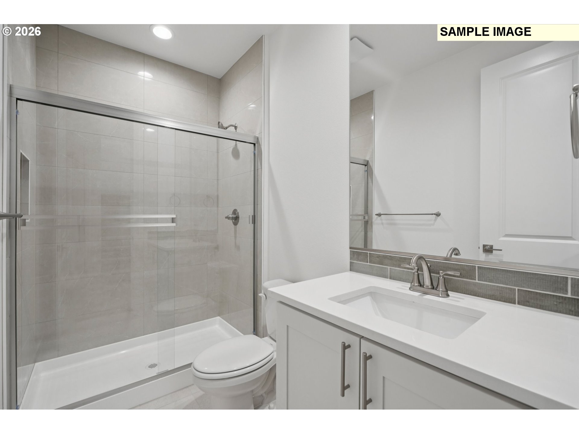 9302 North Clover Street, Unit LOT 267 Camas, WA 98607 - Photo 16 of 33 a bathroom with a sink a toilet and shower