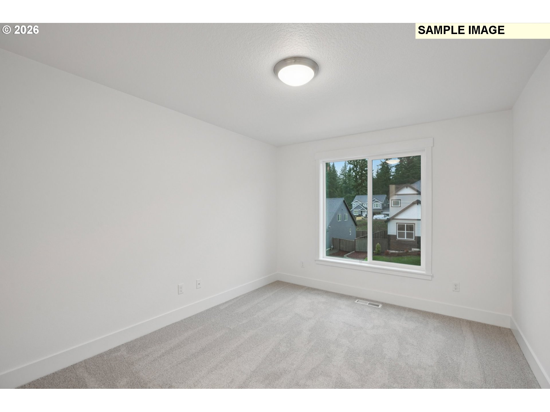 9302 North Clover Street, Unit LOT 267 Camas, WA 98607 - Photo 23 of 33 a view of an empty room with a window