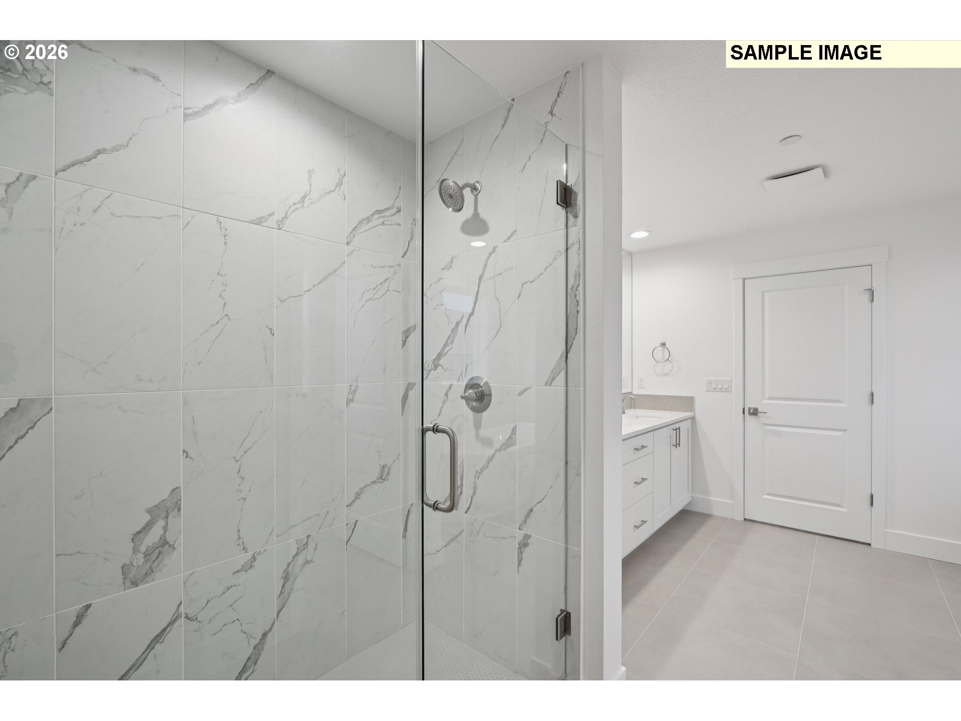 9302 North Clover Street, Unit LOT 267 Camas, WA 98607 - Photo 29 of 33 a bathroom with a shower and a glass door