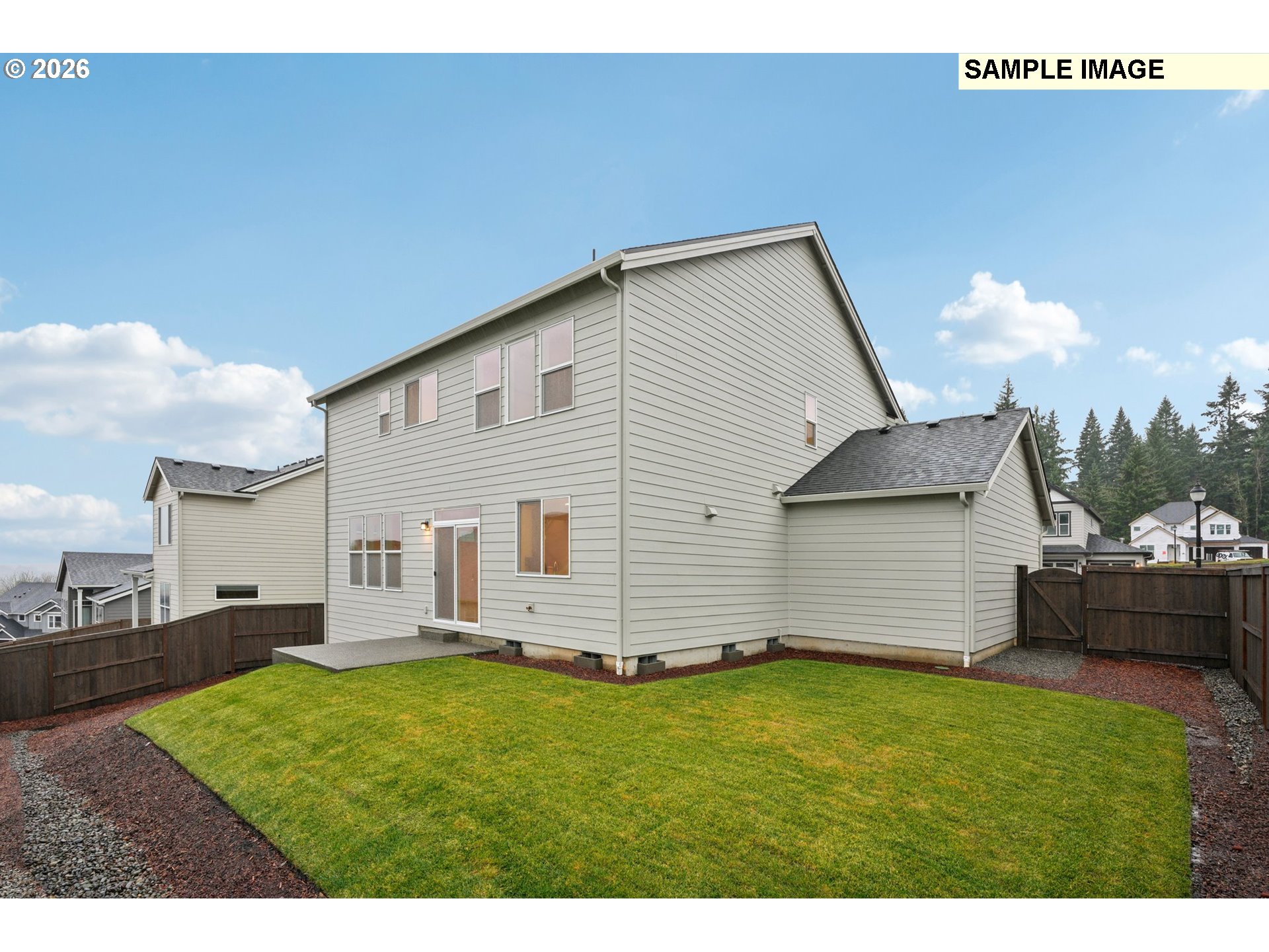 9302 North Clover Street, Unit LOT 267 Camas, WA 98607 - Photo 32 of 33 a view of a backyard with sitting area