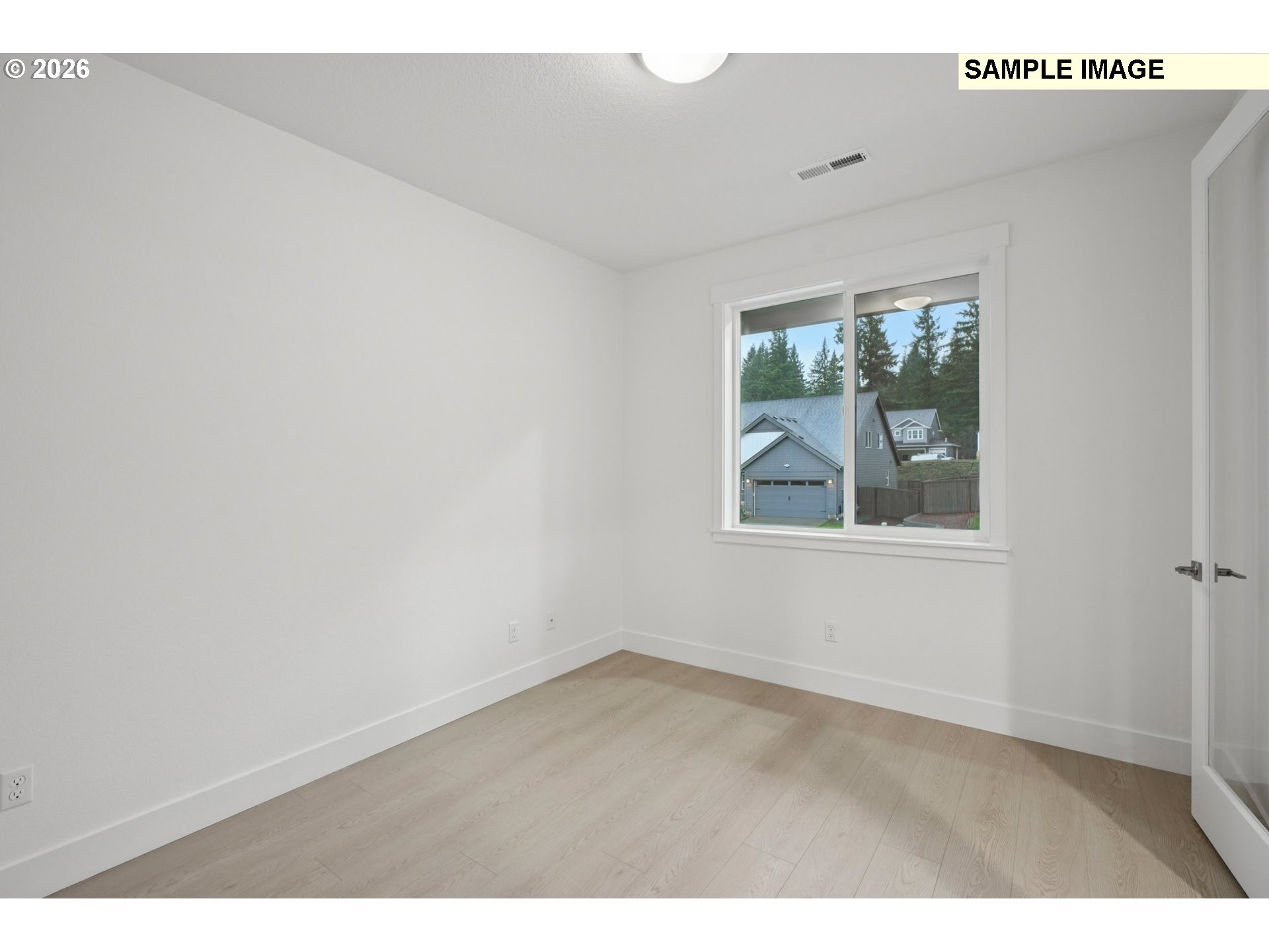 9302 North Clover Street, Unit LOT 267 Camas, WA 98607 - Photo 5 of 33 a view of an empty room with a window
