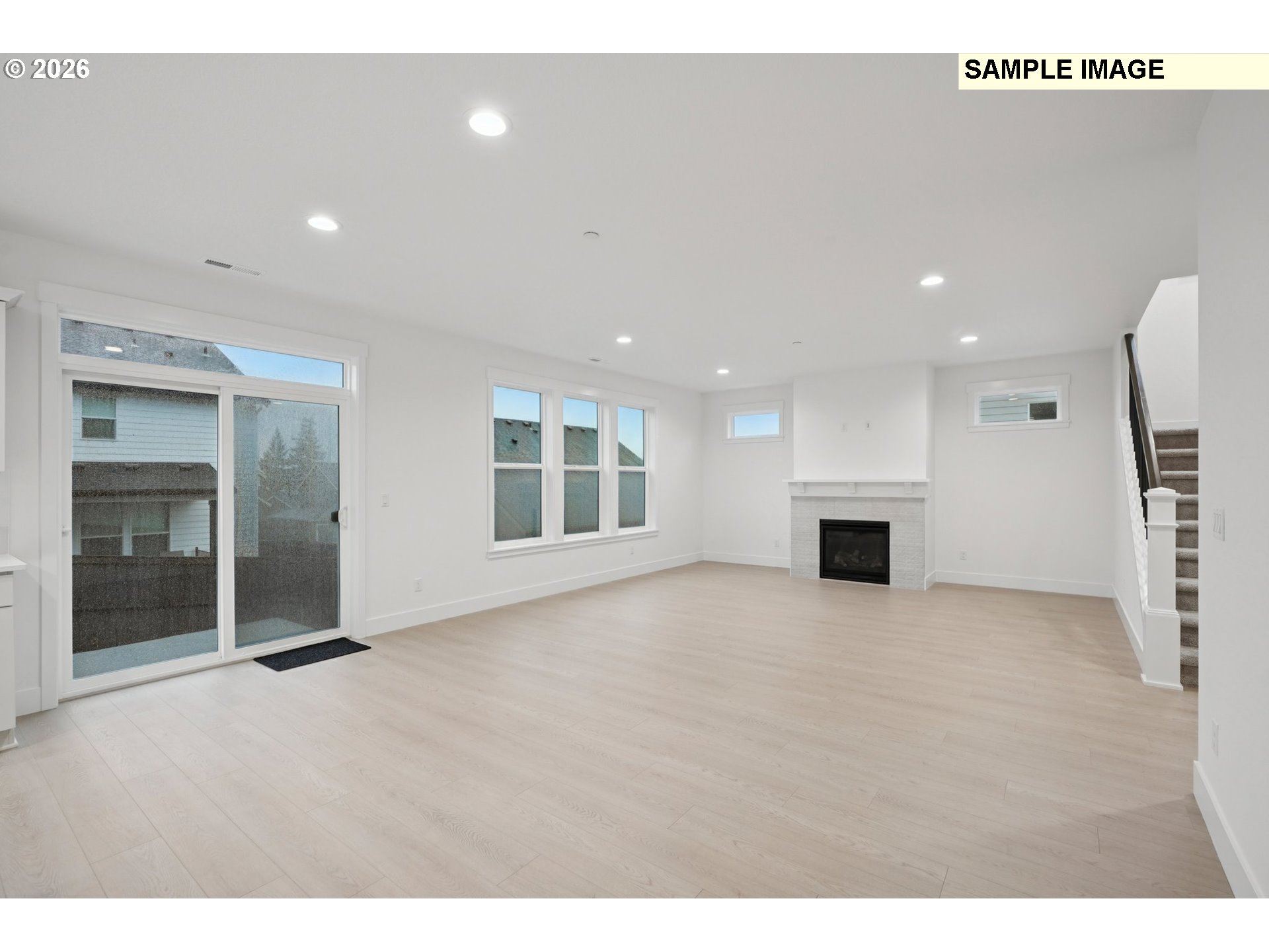 9302 North Clover Street, Unit LOT 267 Camas, WA 98607 - Photo 7 of 33 a view of an empty room with a fireplace