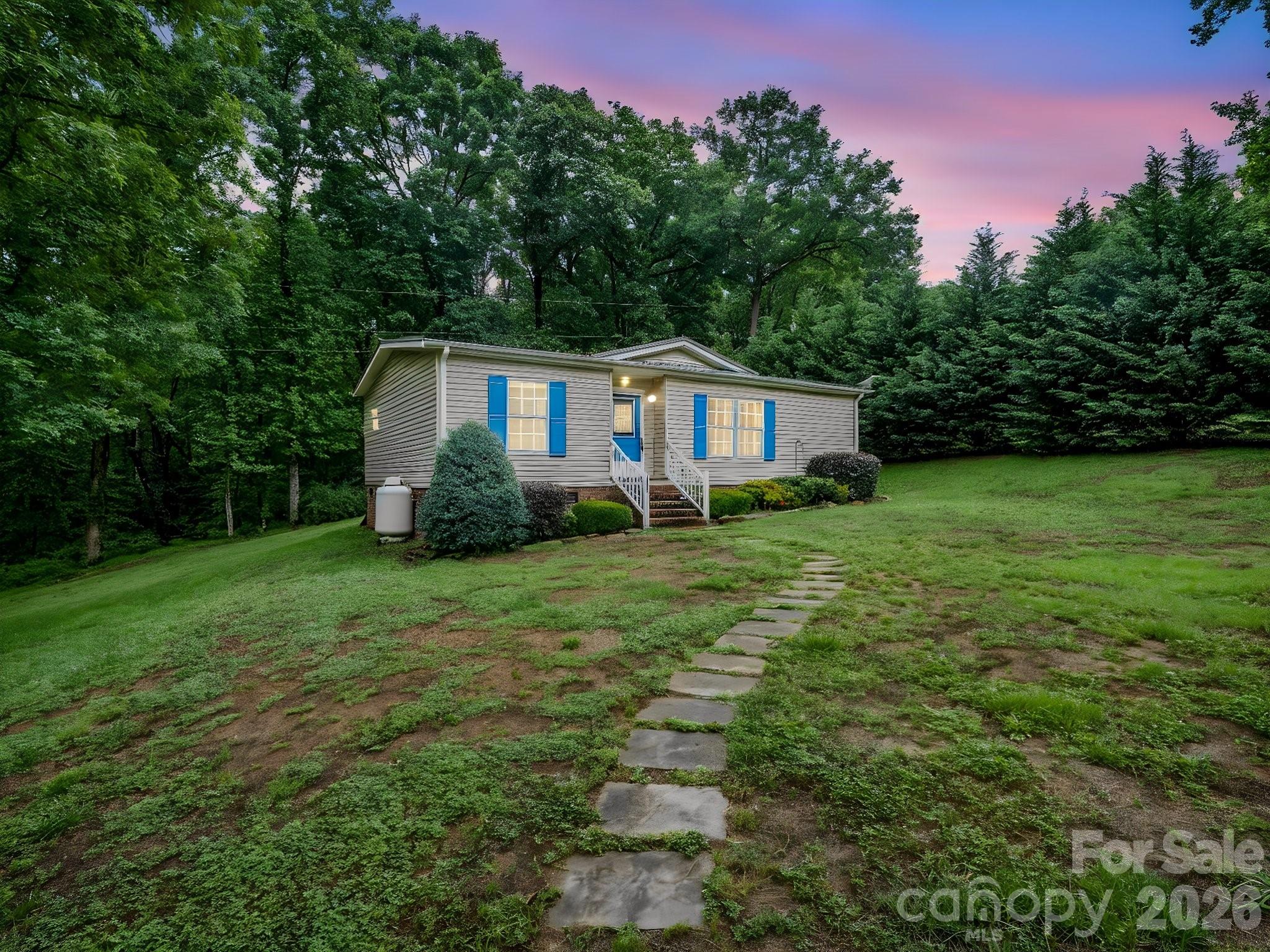 a house with garden in front of it