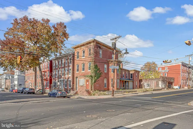 a view of a building and a street