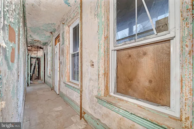 a view of livingroom with furniture and closet