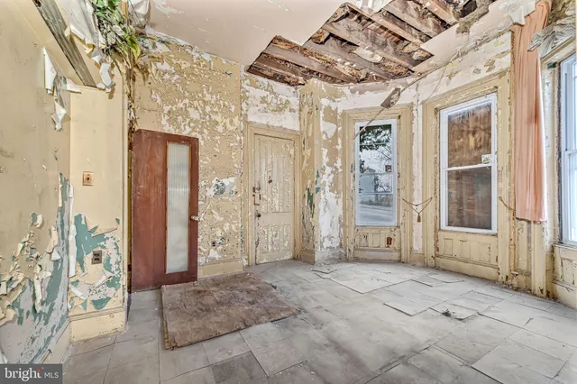 a view of a bathroom from a hallway