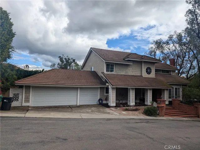 a front view of a house with entertaining space