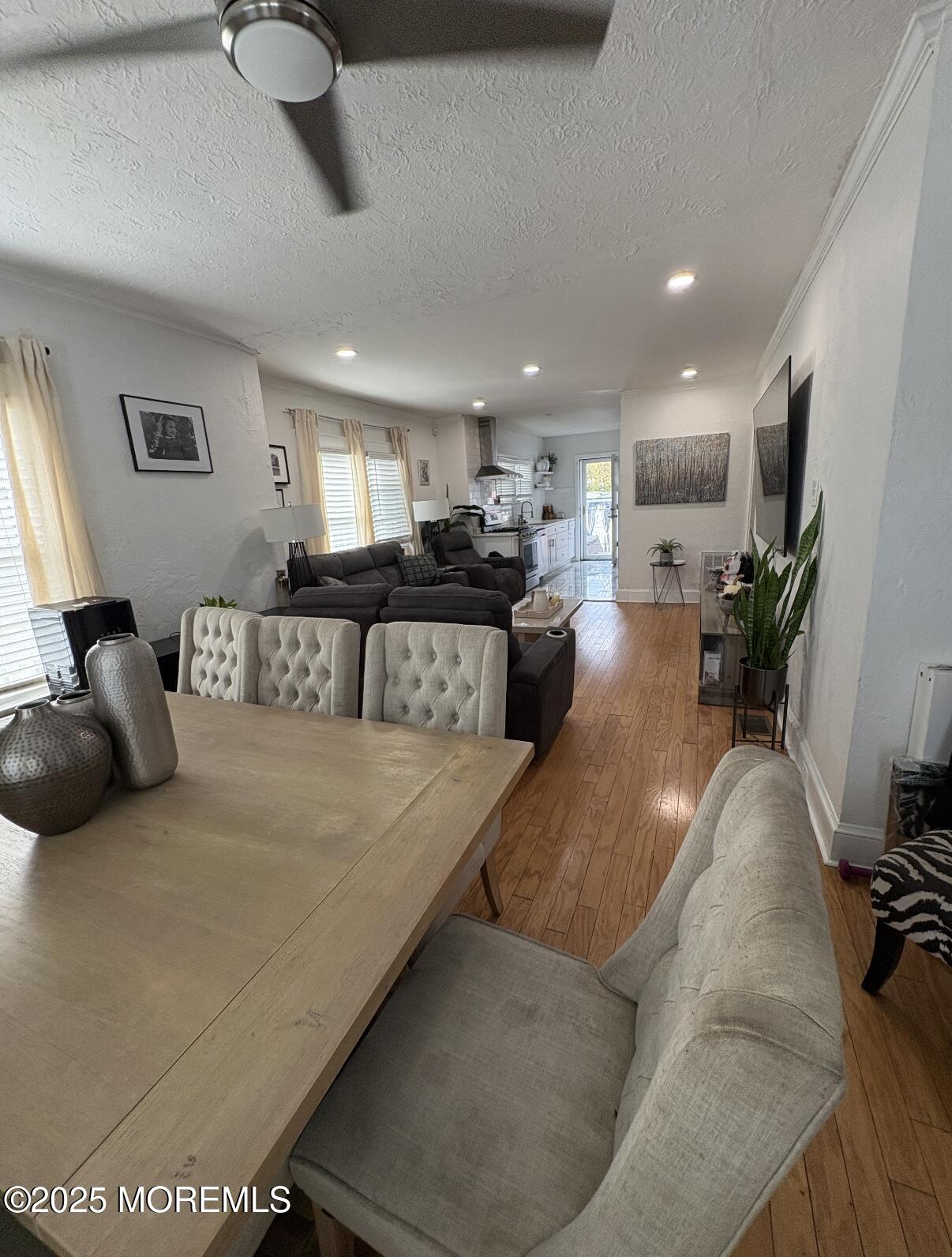 154 Lower Main Street Aberdeen, NJ 07747 - Photo 5 of 10 a living room with furniture and a large window