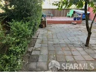 a view of yard along with trees