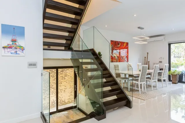 a view of entryway with stairs and furniture