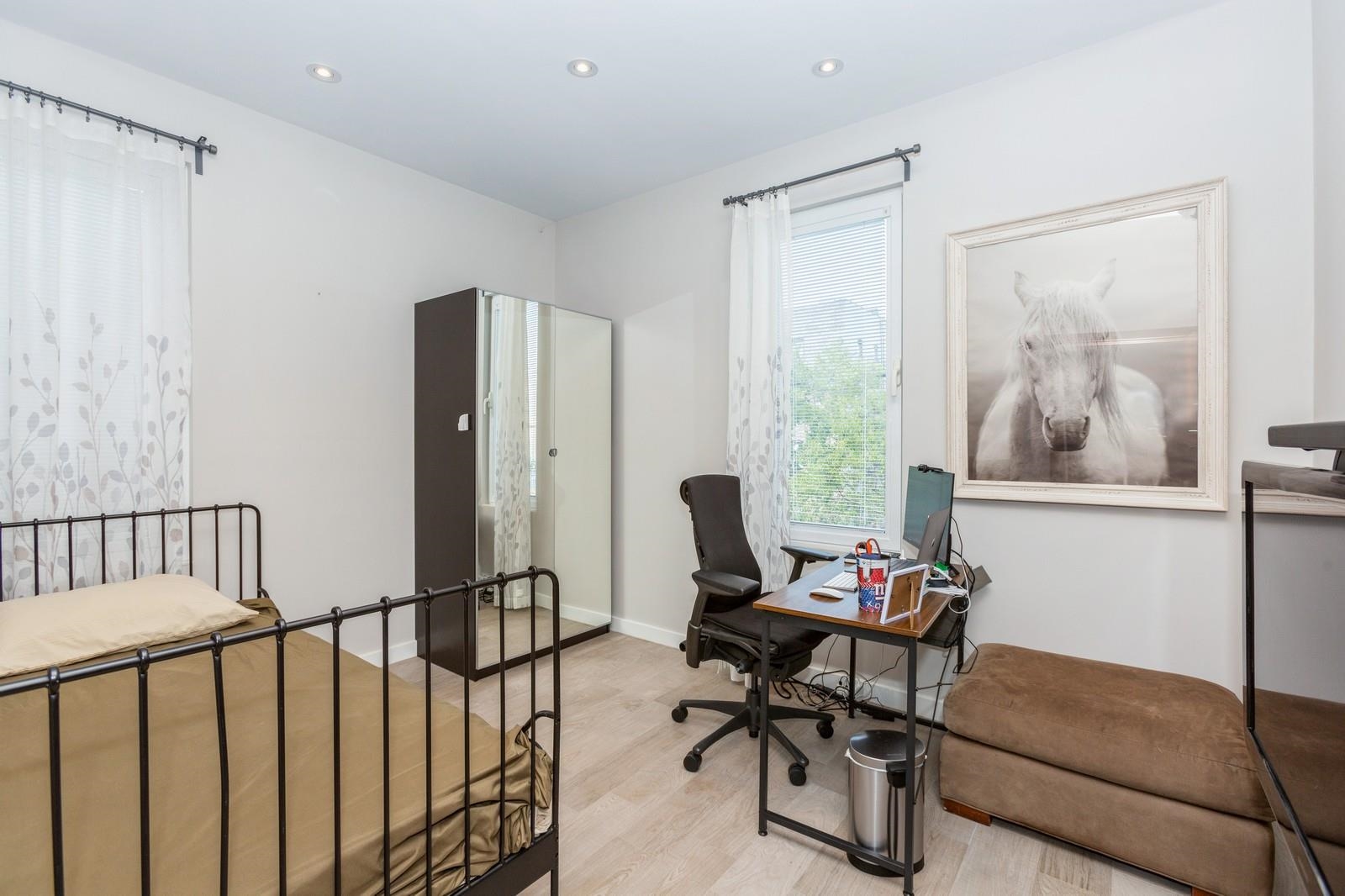 96 Columbia Terrace, Unit 1 Weehawken, NJ 07086 - Photo 20 of 40 a work room with furniture and a window