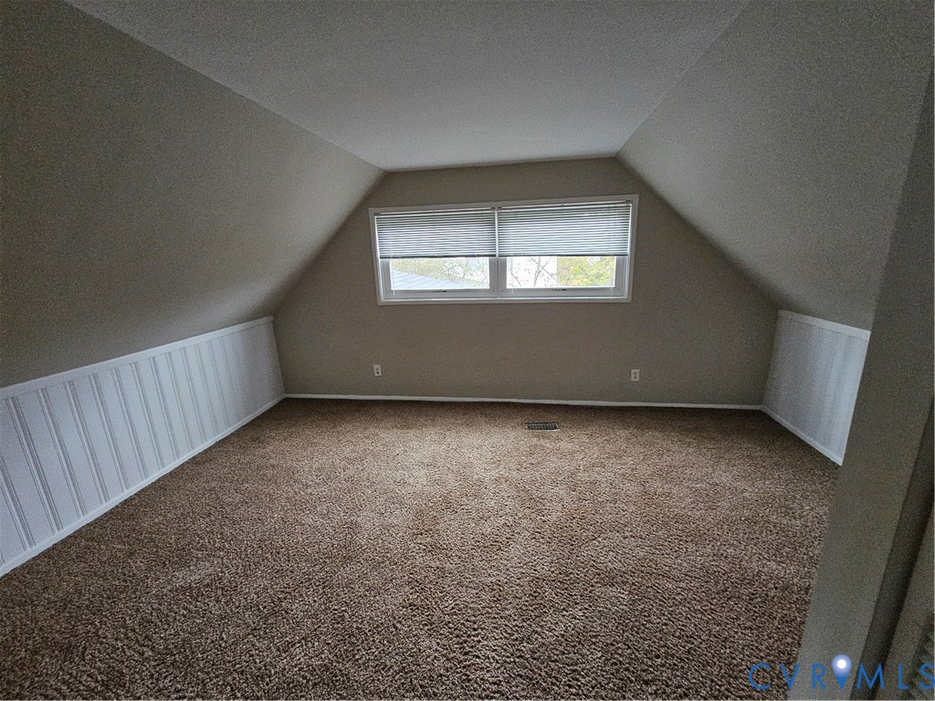 1313 Wembly Road Henrico, VA 23229 - Photo 15 of 17 Additional living space with carpet floors, vaulte