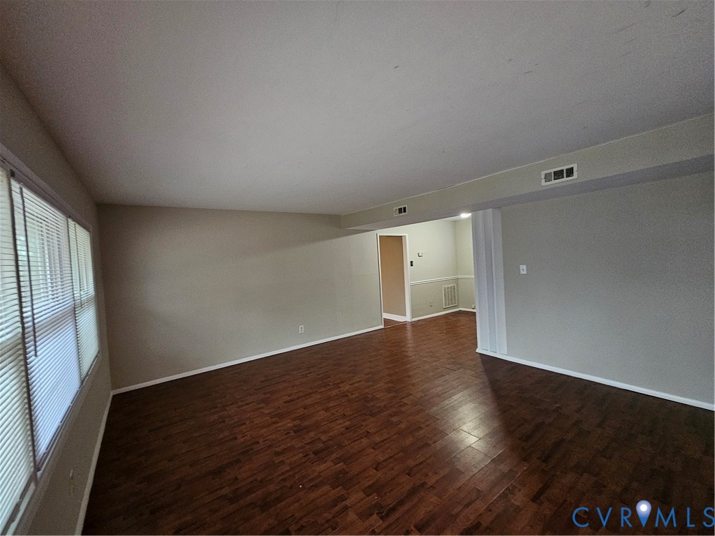 1313 Wembly Road Henrico, VA 23229 - Photo 3 of 17 Spare room featuring dark wood-type flooring and b