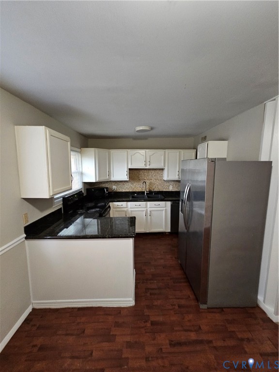 1313 Wembly Road Henrico, VA 23229 - Photo 6 of 17 Kitchen featuring refrigerator, a peninsula, white