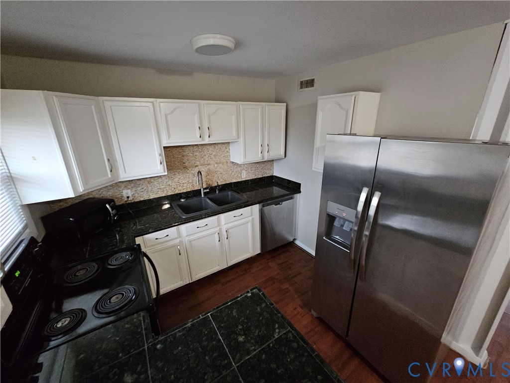 1313 Wembly Road Henrico, VA 23229 - Photo 7 of 17 Kitchen with tile countertops, appliances with sta