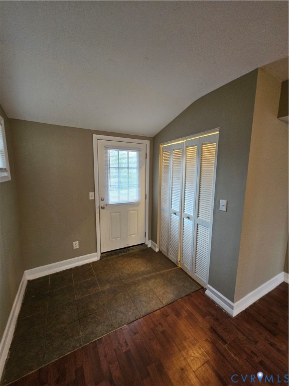 1313 Wembly Road Henrico, VA 23229 - Photo 9 of 17 Entryway featuring dark wood-style floors, vaulted