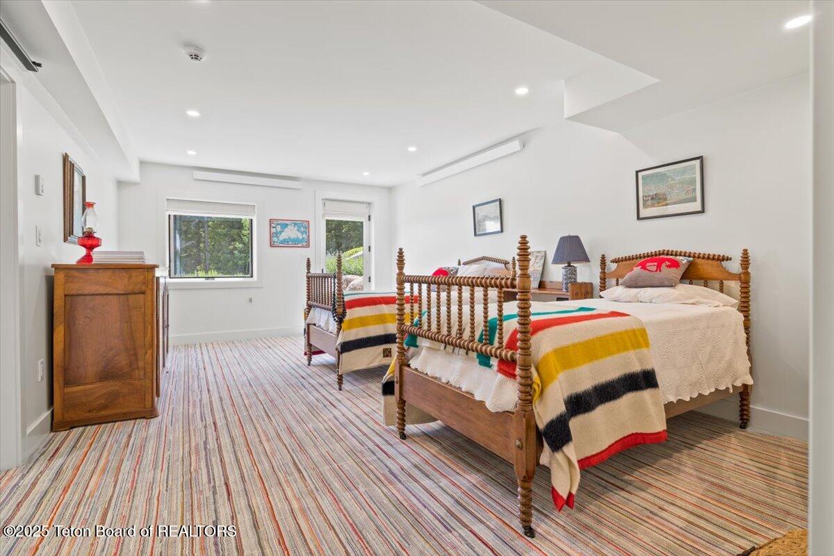 7000 West Gill Huff Road Wilson, WY 83014 - Photo 12 of 37 Downstairs bedroom