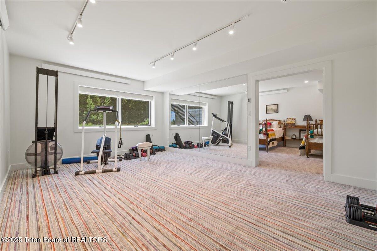 7000 West Gill Huff Road Wilson, WY 83014 - Photo 13 of 37 Downstairs fitness room