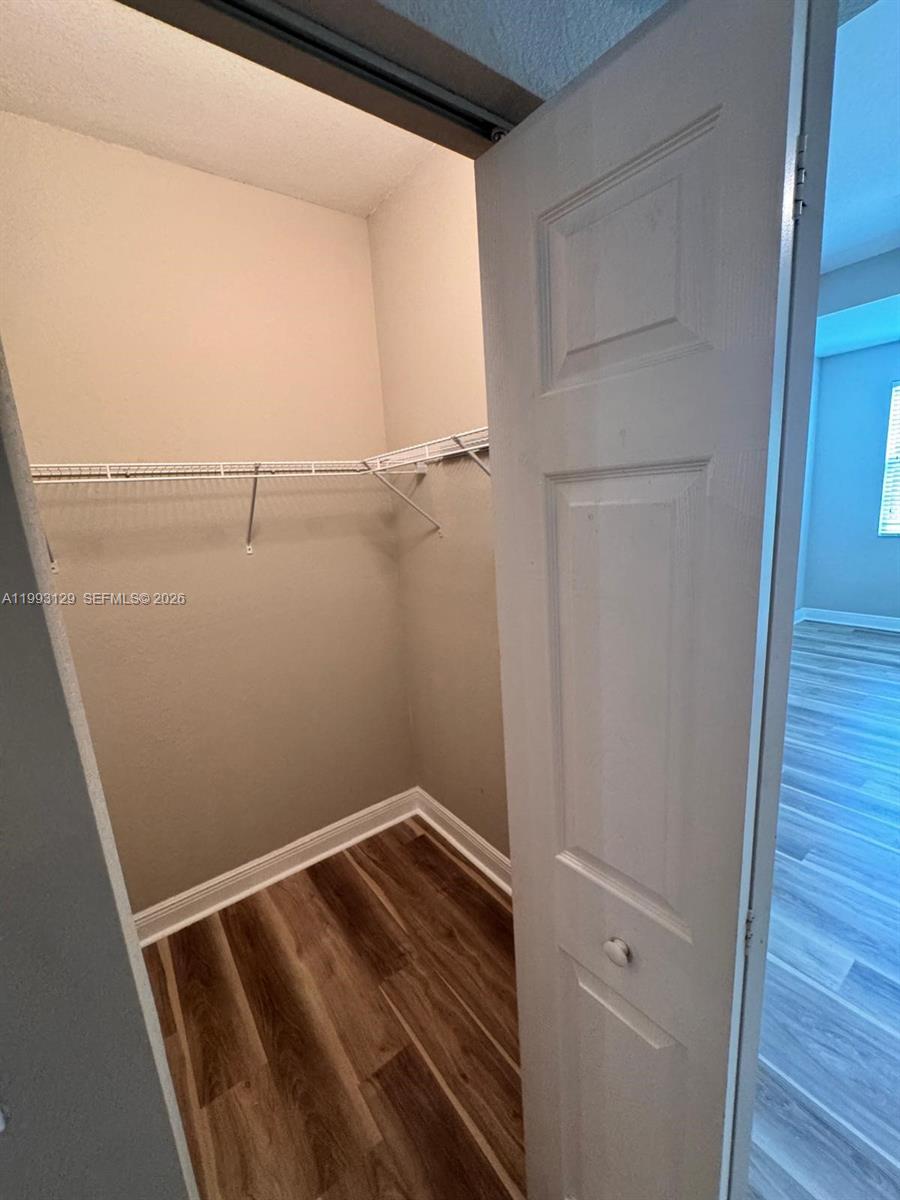 11980 Southwest 29th Street Miramar, FL 33025 - Photo 36 of 56 a view of small space with racks on the wall