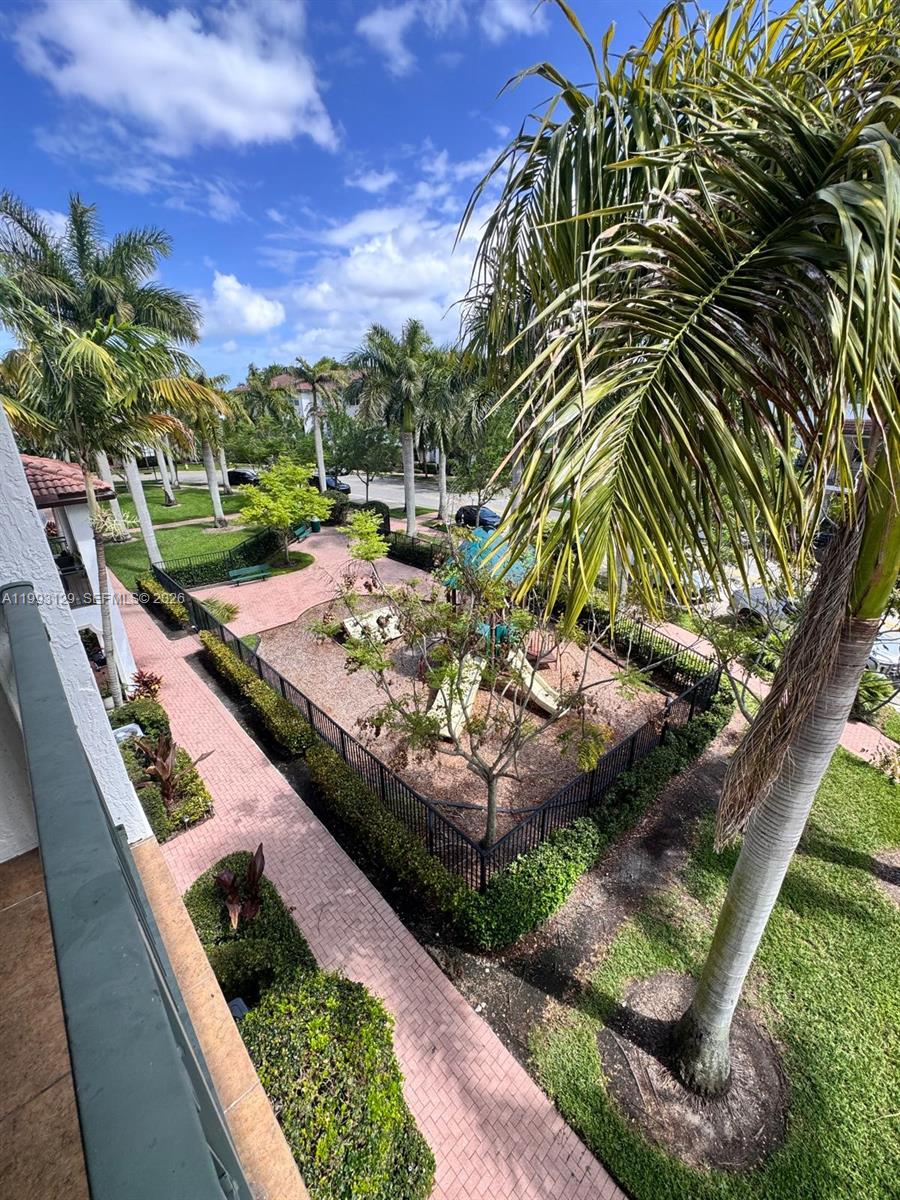 11980 Southwest 29th Street Miramar, FL 33025 - Photo 46 of 56 a view of a backyard with sitting area