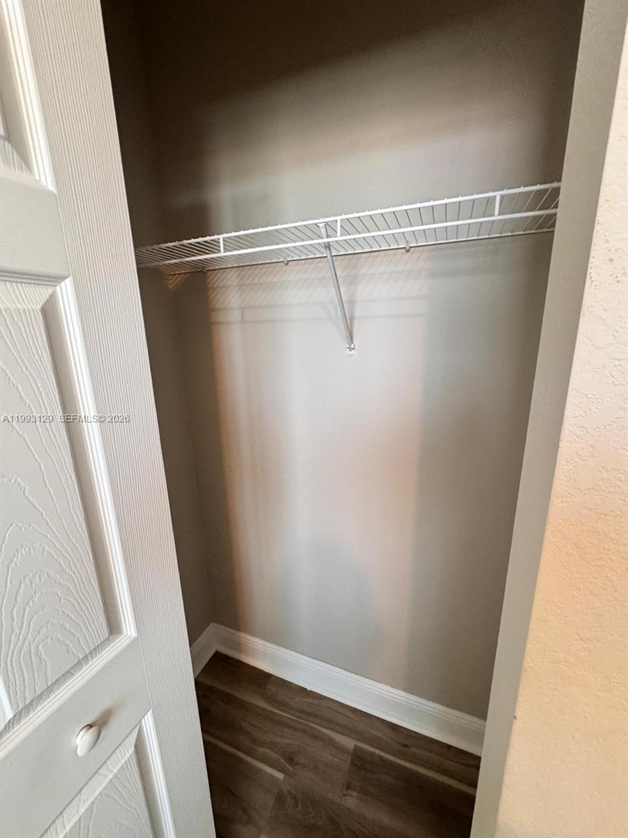 11980 Southwest 29th Street Miramar, FL 33025 - Photo 52 of 56 a view of small space with wooden floor