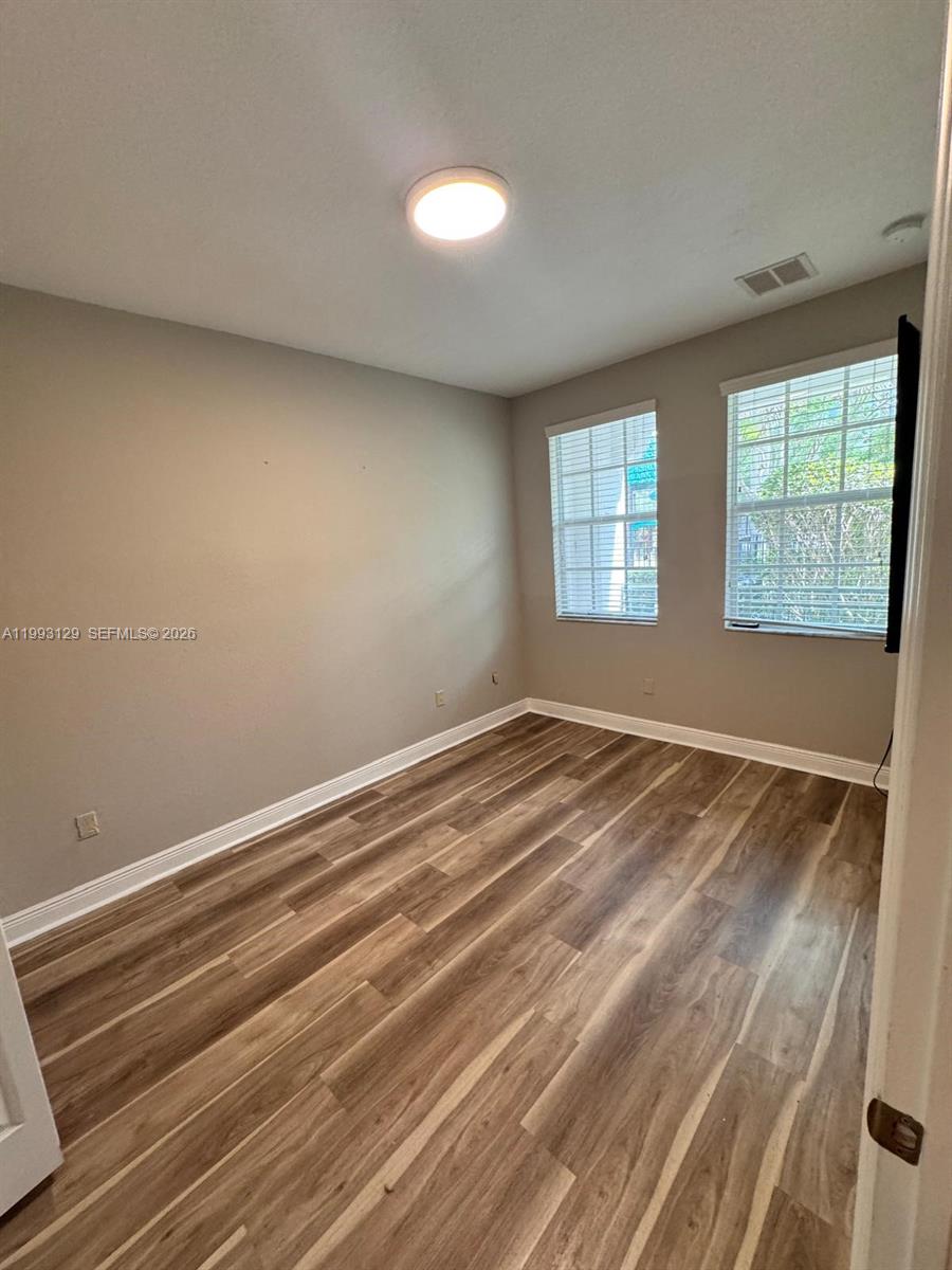 11980 Southwest 29th Street Miramar, FL 33025 - Photo 9 of 56 a view of empty room with window