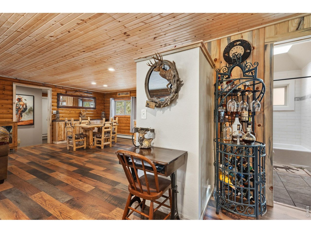 12743 Rist Canyon Road Bellvue, CO 80512 - Photo 23 of 49 a view of a dining room with furniture