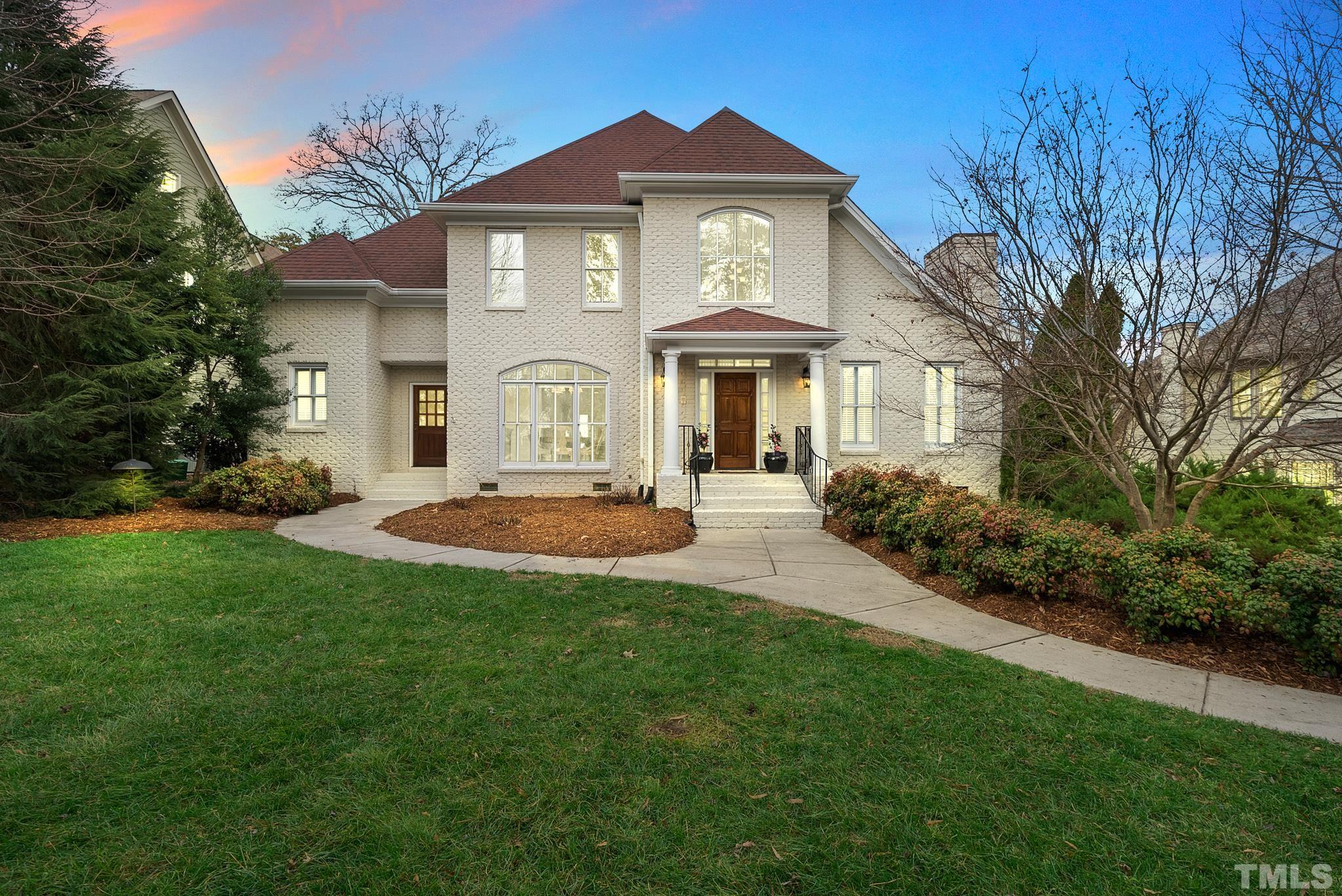 3044 Farrior Road Raleigh, NC 27607 - Photo 1 of 64 a front view of a house with a yard