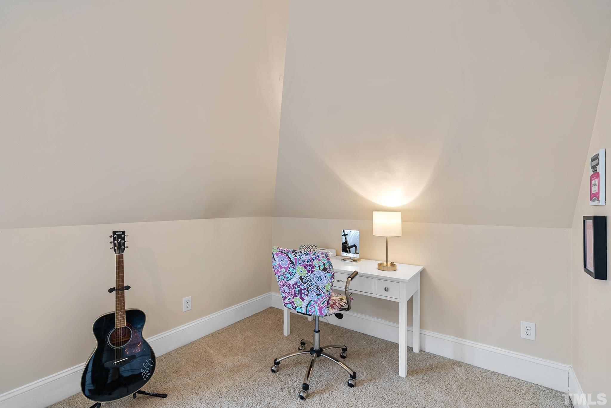 3044 Farrior Road Raleigh, NC 27607 - Photo 30 of 64 a room with a table and chairs