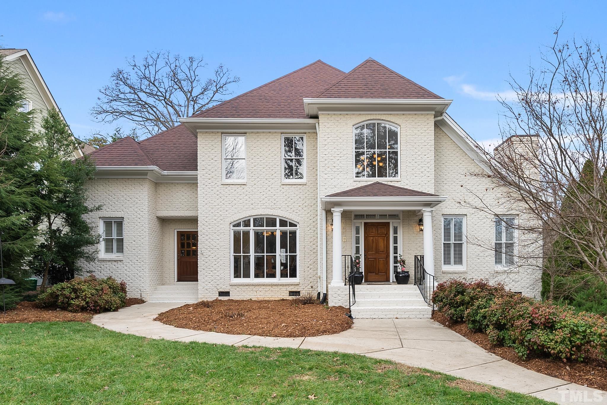 3044 Farrior Road Raleigh, NC 27607 - Photo 44 of 64 a front view of a house with a yard