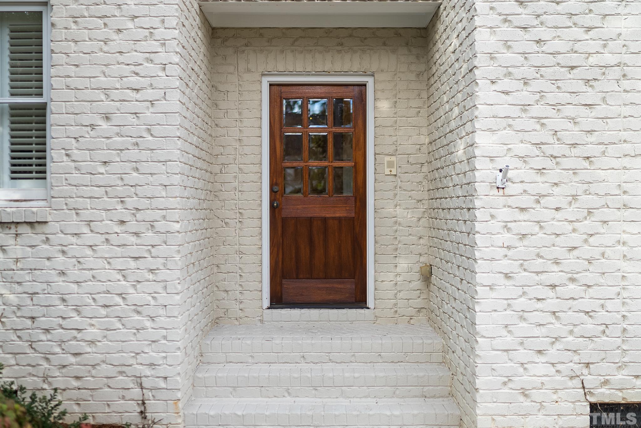 3044 Farrior Road Raleigh, NC 27607 - Photo 51 of 64 a front view of a brick house