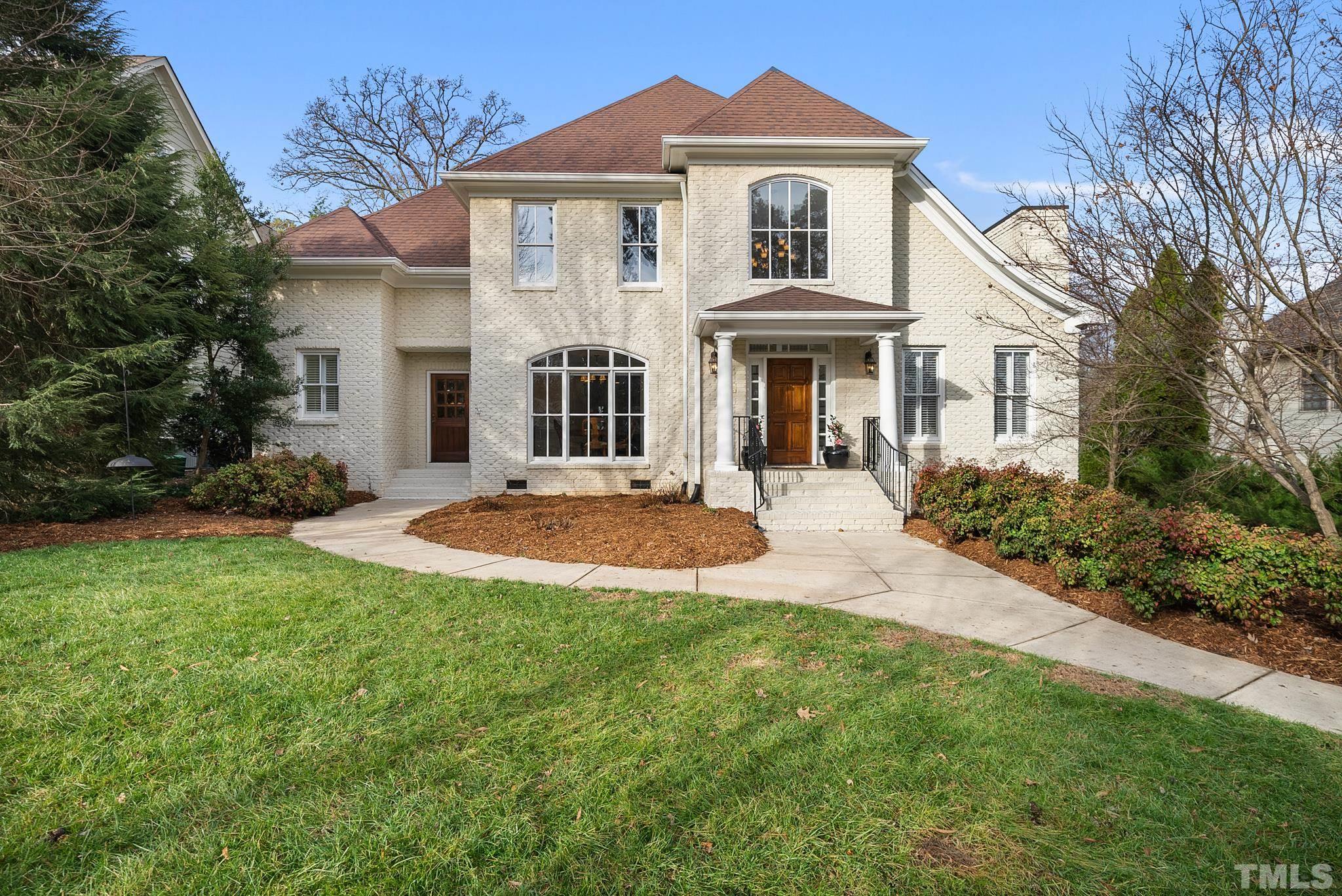 3044 Farrior Road Raleigh, NC 27607 - Photo 52 of 64 a front view of a house with a yard