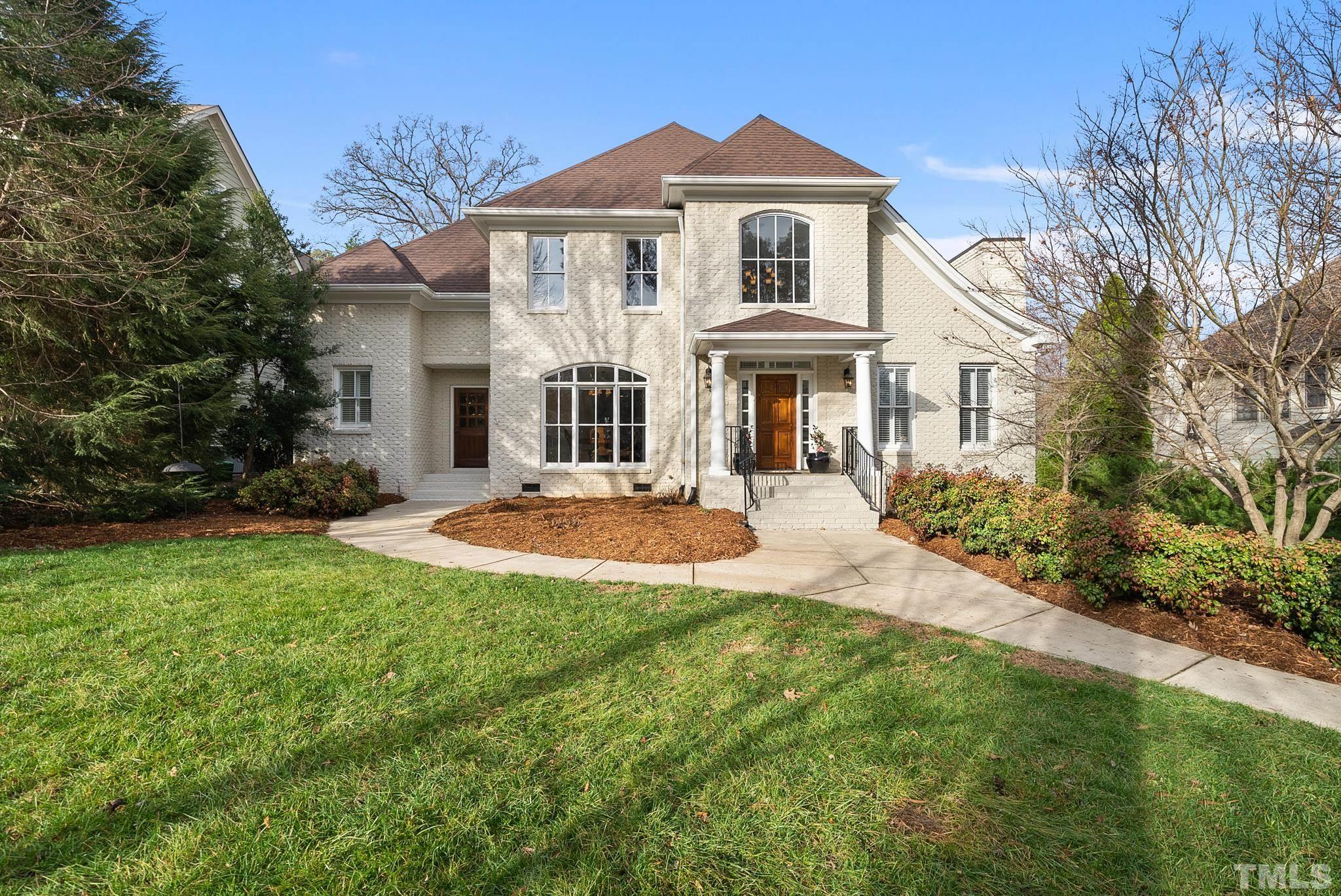 3044 Farrior Road Raleigh, NC 27607 - Photo 53 of 64 a front view of a house with a yard