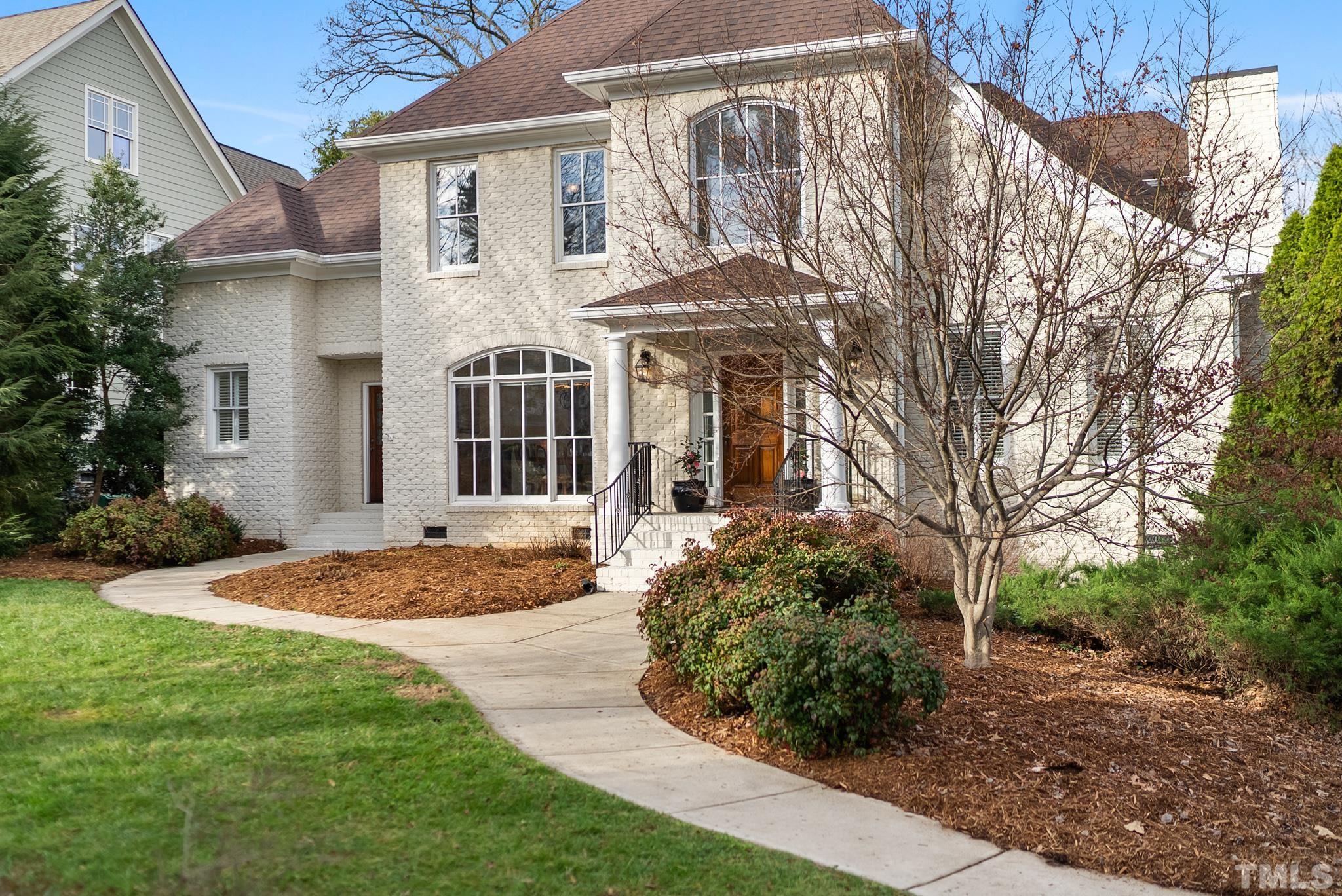 3044 Farrior Road Raleigh, NC 27607 - Photo 55 of 64 a front view of a house with garden