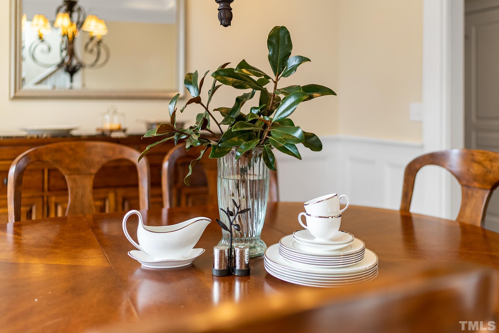 3044 Farrior Road Raleigh, NC 27607 - Photo 63 of 64 a vase of flowers sitting on a table